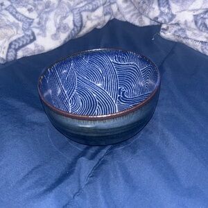 Bowl with design. Width- 5 inches. Length- 4.7 inches